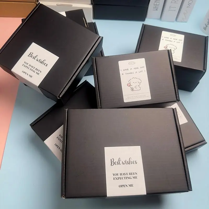 black corrugated apparel packaging boxes offset printed T-shirt shipping carton UGI Packaging