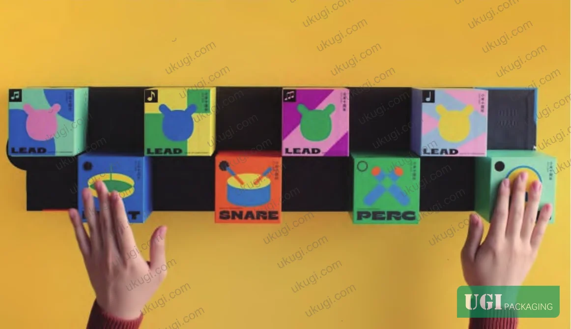 Figure 3: Festival gift packaging with embedded audio module triggered by percussion-sensitive switches in carton exterior panels