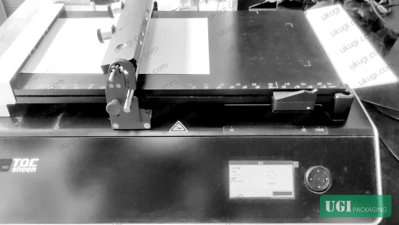 Figure 5: Automated coating machine application of water-based varnish — demonstrating controlled film weight and uniformity across high-speed substrate feed