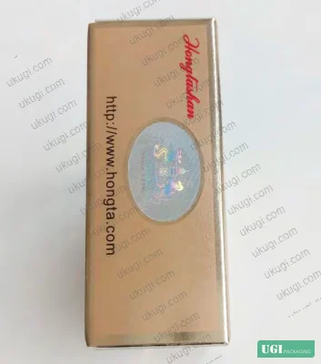 Figure 2: Holographic foil stamping and embossing detail on premium folding carton with dual-station processing