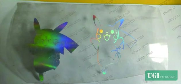 Figure 12: Laser holographic transfer (镭射转印) — micro-grating structure transfer to paper, plastic, metal, and glass substrates
