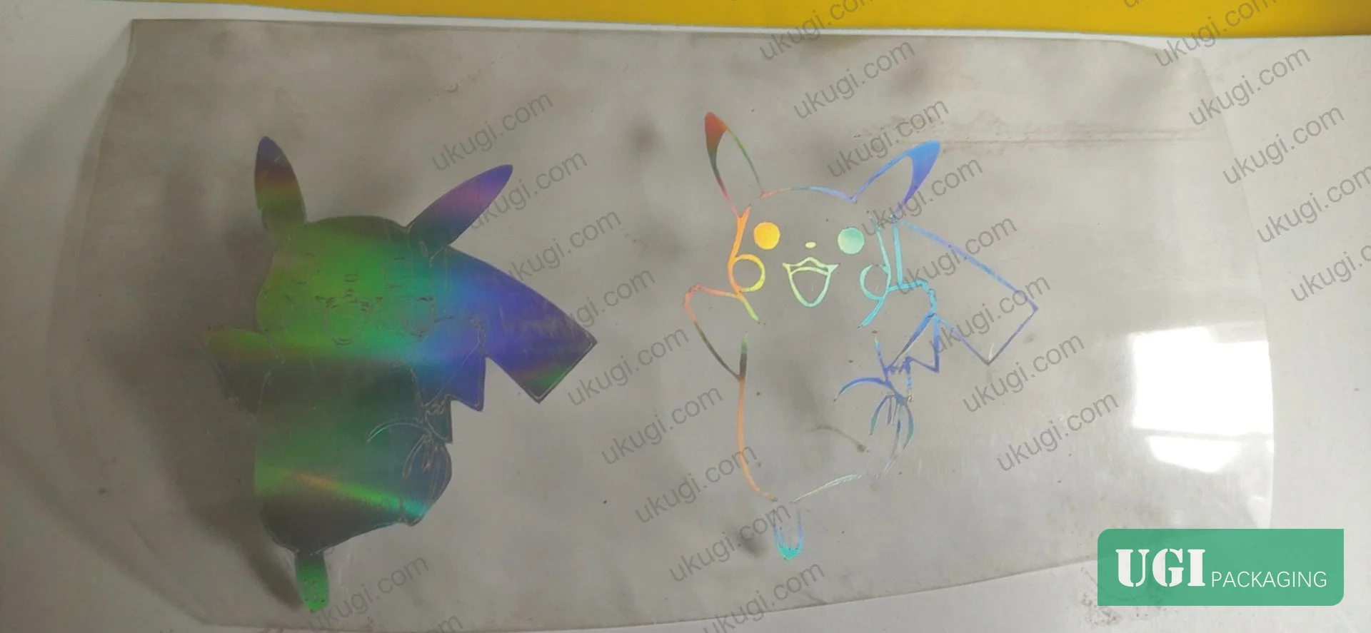 Figure 12: Holographic laser transfer process showing micro-grating structure transfer onto mixed substrate types for anti-counterfeiting and decorative packaging