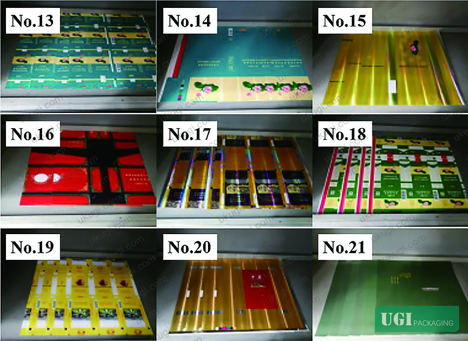 Figure 3: Test sample groups showing raw holographic substrates (No.1–12), semi-finished prints (No.13–21), and finished print products (No.22–27)