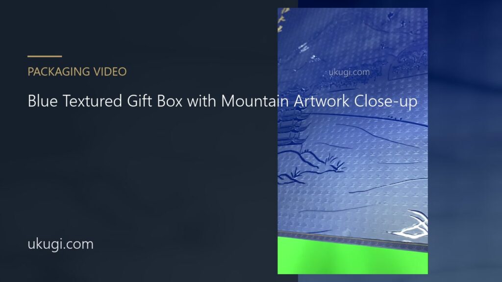 Blue Textured Gift Box with Mountain Artwork Close-up | ukugi.com