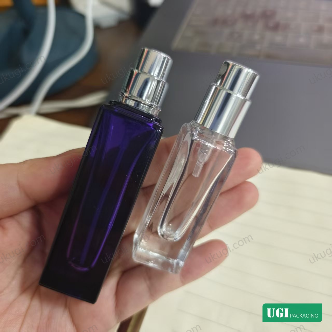 UGI Packaging square glass perfume atomizer reference with exposed pumps
